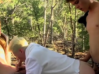 Young hotties barebacking their friend in the forest